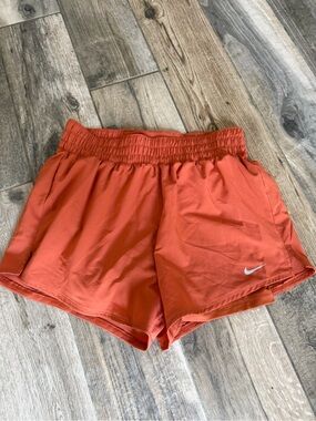 Nike Women’s Rust Orange Running Shorts